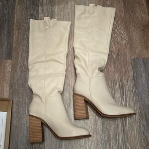 Cream high heeled boots